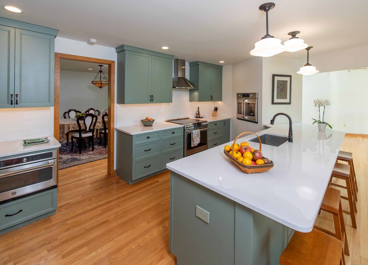 kitchen with bar and stools